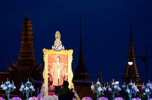 Tousends of Thai People at the ceremony of the coronation Day of the King Bhumibol on the Sanam Square Park on the 5. May in the city of Bangkok in Tahiland, Southeastasia.