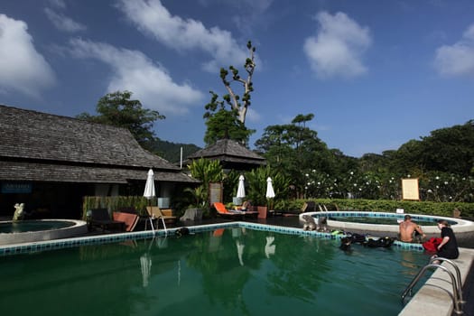 a hotel pool at the Beach at Hat Sai Ri on thel Ko Tao Island in the Gulf of Thailand in the southeast of Thailand in Southeastasia.