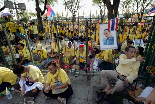Tousends of Thai People at the ceremony of the coronation Day of the King Bhumibol on the Sanam Square Park on the 5. May in the city of Bangkok in Tahiland, Southeastasia.