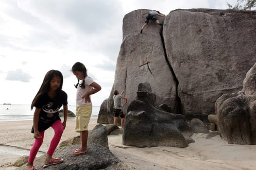 climbing at the Beach at Hat Sai Ri on thel Ko Tao Island in the Gulf of Thailand in the southeast of Thailand in Southeastasia.