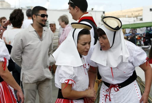 a traditional Dance in the old town of Teguise on the Island of Lanzarote on the Canary Islands of Spain in the Atlantic Ocean. on the Island of Lanzarote on the Canary Islands of Spain in the Atlantic Ocean..