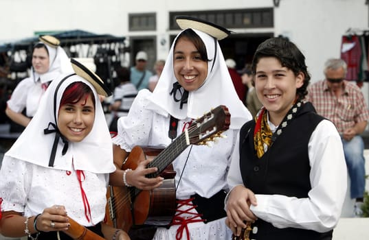a traditional Dance in the old town of Teguise on the Island of Lanzarote on the Canary Islands of Spain in the Atlantic Ocean. on the Island of Lanzarote on the Canary Islands of Spain in the Atlantic Ocean..