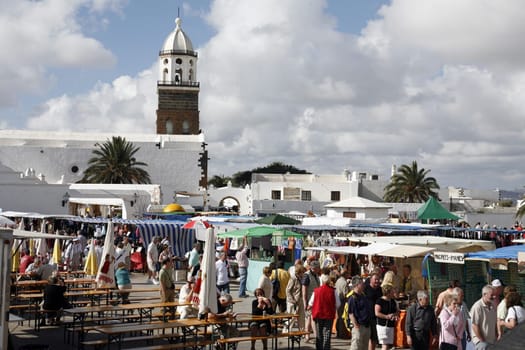 the sunday market in the old town of Teguise on the Island of Lanzarote on the Canary Islands of Spain in the Atlantic Ocean. on the Island of Lanzarote on the Canary Islands of Spain in the Atlantic Ocean..