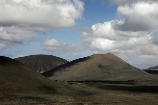 The Vulkan National Park Timanfaya on the Island of Lanzarote on the Canary Islands of Spain in the Atlantic Ocean. on the Island of Lanzarote on the Canary Islands of Spain in the Atlantic Ocean..