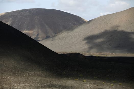 The Vulkan National Park Timanfaya on the Island of Lanzarote on the Canary Islands of Spain in the Atlantic Ocean. on the Island of Lanzarote on the Canary Islands of Spain in the Atlantic Ocean..