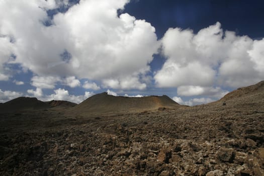 The Vulkan National Park Timanfaya on the Island of Lanzarote on the Canary Islands of Spain in the Atlantic Ocean. on the Island of Lanzarote on the Canary Islands of Spain in the Atlantic Ocean..