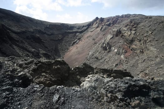 The Vulkan National Park Timanfaya on the Island of Lanzarote on the Canary Islands of Spain in the Atlantic Ocean. on the Island of Lanzarote on the Canary Islands of Spain in the Atlantic Ocean..
