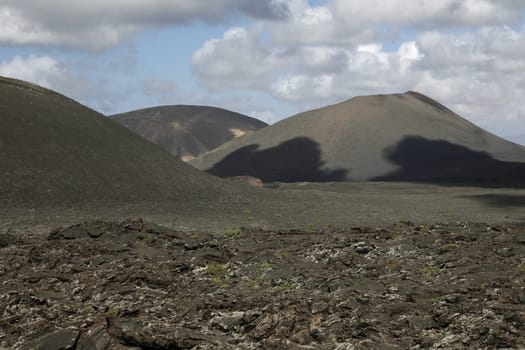 The Vulkan National Park Timanfaya on the Island of Lanzarote on the Canary Islands of Spain in the Atlantic Ocean. on the Island of Lanzarote on the Canary Islands of Spain in the Atlantic Ocean..