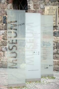 Berlin,Germany - June 21,2016: Labeled glass information boards in front of the Nikolaikirche in front of the entrance to the museum on June 21,2016 in Berlin.