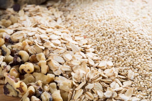 Quinoa, rolled oats and chopped walnuts for baking
