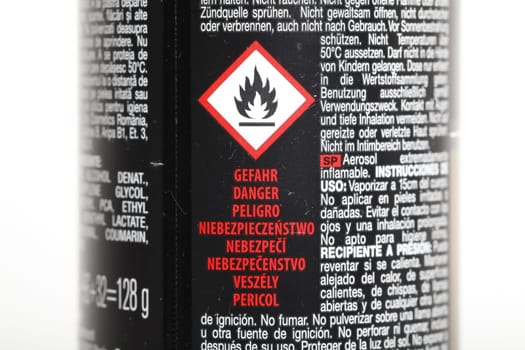 Danger symbol on deodorant bottle