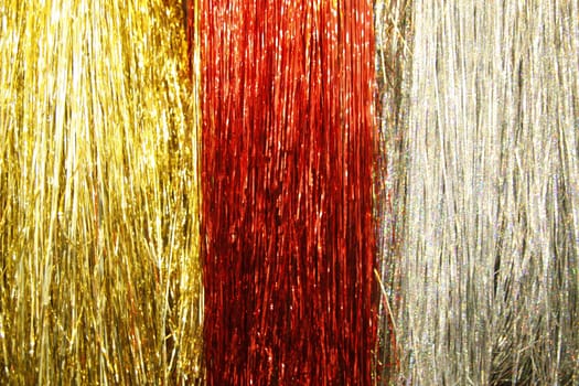 Tinsel in golden red and silver