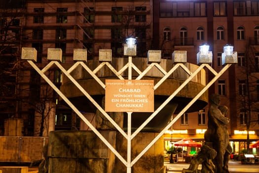 Channuka Lichterstfest with three candles at Wittenbergplatz in Berlin