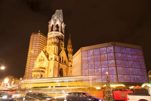 Traffic and christmas market at Gedaechtnischurchn in Berlin at christmas time