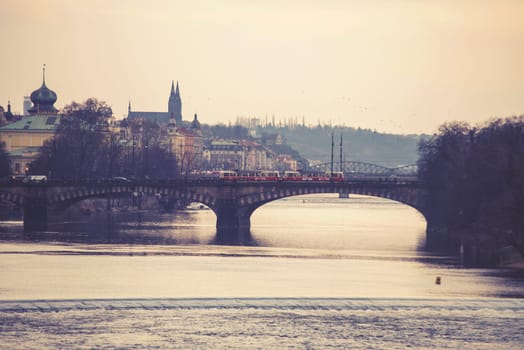 bridge over vltava river in prague,czech republic. vintage effect