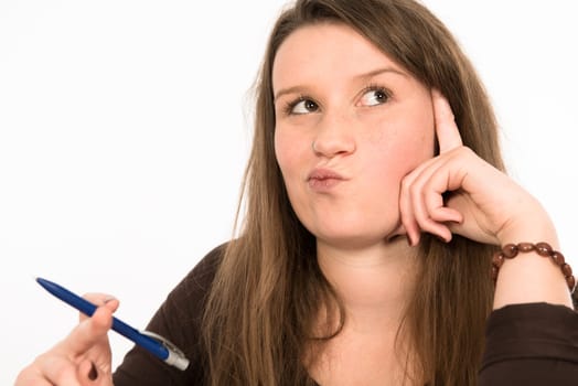 young woman in front of white background is reflecting