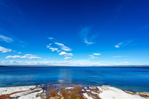 Water from natural pools running into Yellowstone Lake at West Thumb Geyser Basin in Yellowstone National Park
