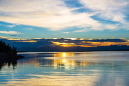 Beautiful dramatic sunrise over Yellowstone Lake in Yellowstone National Park