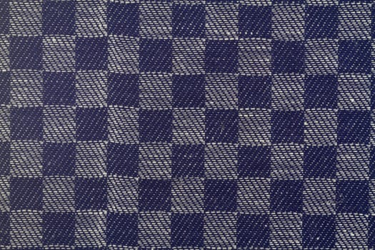 Checkered kitchen towel in detail as background