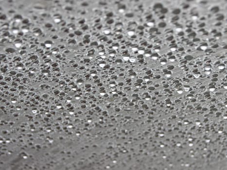 Water Damp Moisture Condensation under Striped Plastic Roof in a Small Outdoor Swimming Pool. Cold outside - but Warm Inside.