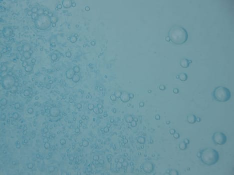 Deep Light Blue Swimming Pool Water with One Large Bubble Background Abstract Pattern