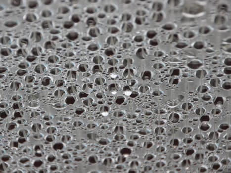 Water Damp Moisture Condensation under Plastic Roof in a Small Outdoor Swimming Pool. Cold outside - but Warm Inside.
