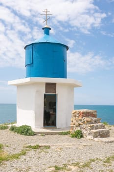 Big Utrish, Russia - May 17 2016: Chapel at the monument-Utrish lighthouse on the island, built in 1975 in tribute to all sailors Azov-Black Sea fleet, as well as the crew of the vehicle "Fabricius"" vessel, which in World War II was torpedoed by the Germans"