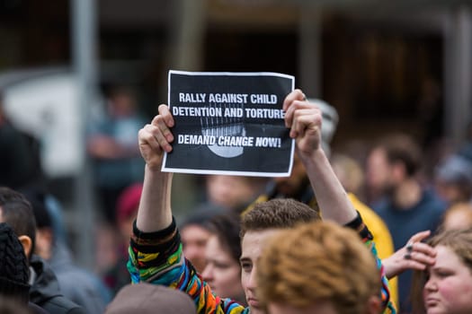 MELBOURNE/AUSTRALIA - 30 JULY , 2016: Protesters rally against the torture and detention of indigious childtren in the Northern Territory. The rally was held outside the State Library.