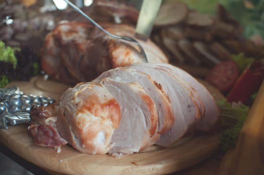 close up on baked meat in table
