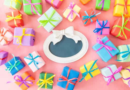 Small gifts wrapped in colorful paper with small ribbons