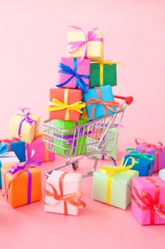Small gifts wrapped in colorful paper with small ribbons
