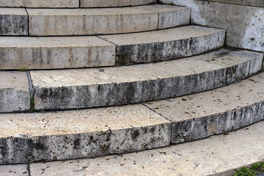 Old stone granite steps closeup view