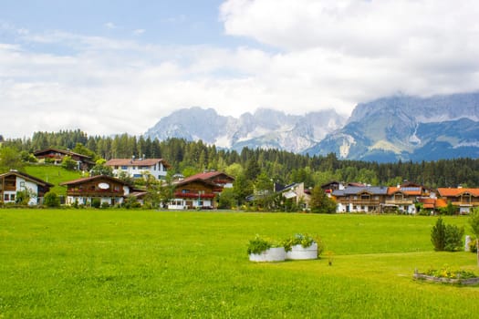 a beautiful view of the austrian alps and Oberndorf in Tirol, Austria
