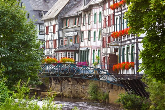 MONSCHAU, GERMANY - JULY 30, 2016: small town Monschau in the Eifel region. The historic town center has many half-timbered houses and narrow streets remained nearly unchanged for 300 years