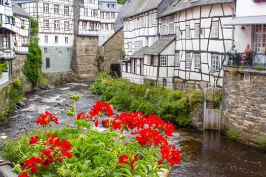 picturesque houses along the Rur River in the historic center of Monschau, Germany