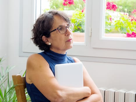 a portrait of a beautiful mature woman with glasses