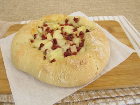 Pizza bread street food with cheese and ham