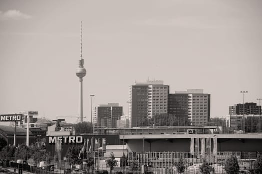 Berlin,Germany - May 09,2016: The urban landscape in Berlin Mitte around the Berlin TV Tower and the wholesale company Metro on May 09,2016 in Berlin.