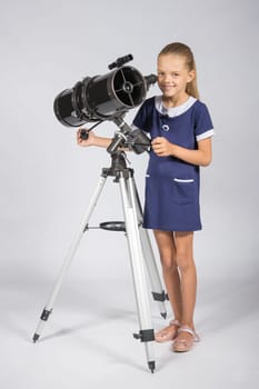The young astronomer sets up a telescope and looked into the frame