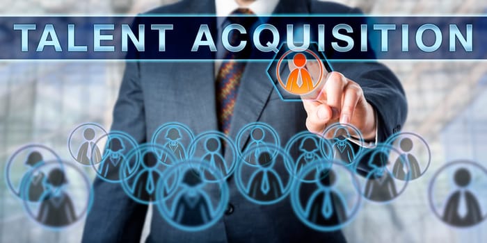 Recruiter is pushing TALENT ACQUISITION on an interactive virtual display. Business concept involving temporary or permanent employment, recruitment challenges and human resource management.