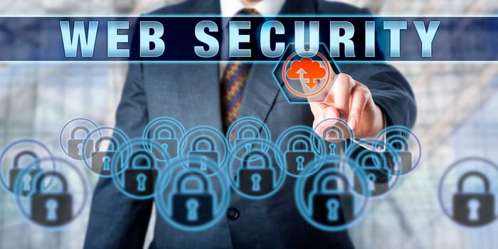 Business executive is pushing WEB SECURITY on an interactive touch screen interface. Business metaphor. Information technology concept for internet security and protection of data transfer.