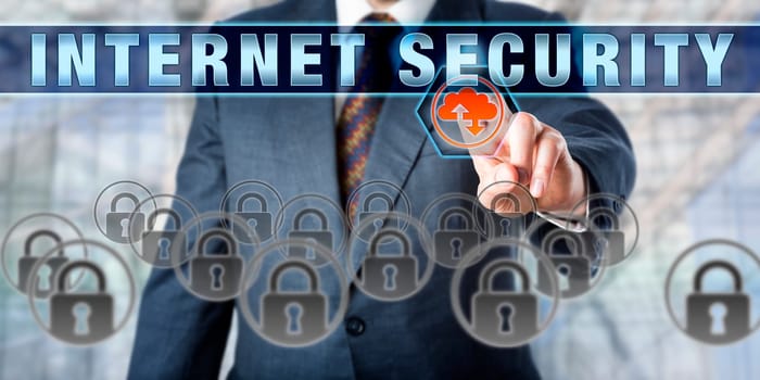 Business manager touching INTERNET SECURITY on an interactive control screen. Information technology concept involving computer and network security, browser security, encryption and data transfer.
