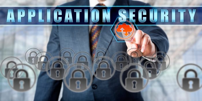 Corporate Manager is touching APPLICATION SECURITY on an interactive control screen. Business metaphor. Information technology concept for prevention of code gaps and computer security.