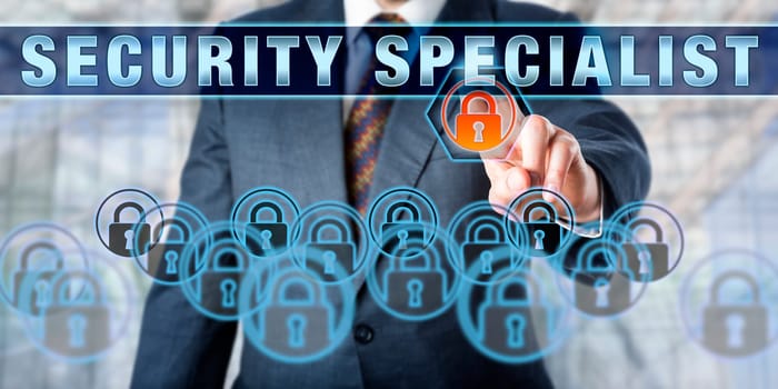 Corporate data manager is pressing SECURITY SPECIALIST on a touch screen interface. Business metaphor and computer security concept for a white collar professional focused on information security.