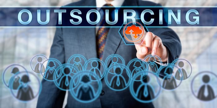 Business manager is pushing OUTSOURCING on an interactive control screen. Business management metaphor and information technology concept for outside resourcing and transfer of employees.