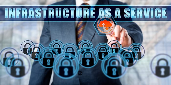 Manager pressing INFRASTRUCTURE AS A SERVICE on an interactive touch screen. Business metaphor. Information technology concept for cloud infrastructure, IaaS, cloud-service model and virtual machines.
