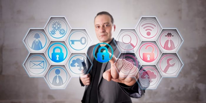 Happy information security professional is closing a lock to secure data via touch. Unprotected computer network remains red. Business concept for data security, computer security, crime prevention.