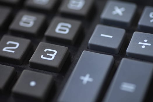 Numbers and symbols on a desk calculator