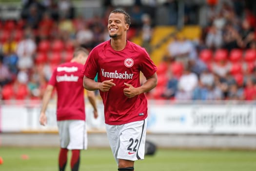 Timothy Chandler (Eintracht Frankfurt) warming up before the friendly match between TSV Steinbach vs. Eintracht Frankfurt on 30.07.2016 in Haiger.