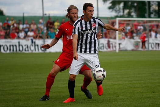 Nico Herzig (TSV Steinbach) and Branimir Hrgota (Eintracht Frankfurt) - TSV Steinbach vs. Eintracht Frankfurt on 30.07.2016 (Photo: Fingerhut)